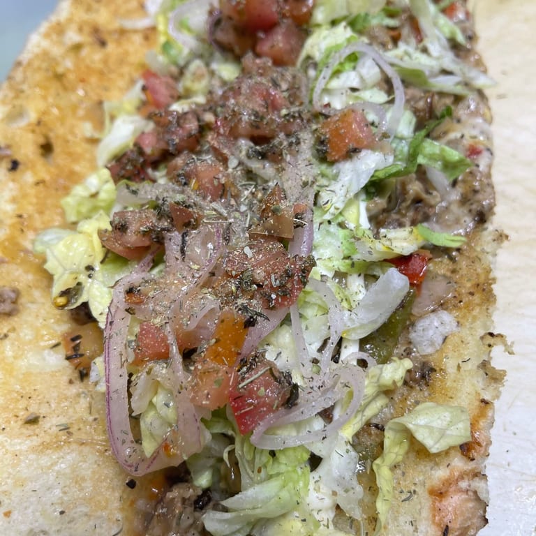 Indulge in Our Cheesesteak